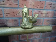 BIRD UNDER A TAP TILLER PIN